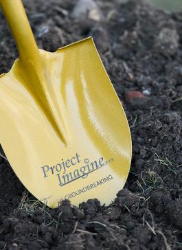 Project Imagine groundbreaking shovel in soil