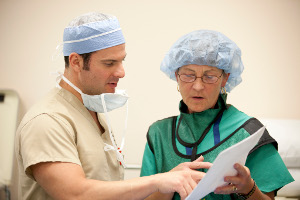 two doctors looking at a file together